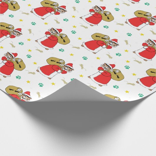 サンタが猫のクリスマスを手に ラッピングペーパー (角)