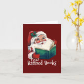 サンタが禁止本を読む カード (黄色い花)