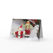 サンタが雪だるまを！