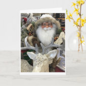 サンタが「聖降誕祭お目出とう」と言う カード (黄色い花)