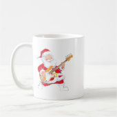サンタがBギターを演奏する クリスマス  コーヒーマグカップ (左)