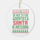 サンタさんがクリスマスを見ている歯医者に親切にする セラミックオーナメント (左)