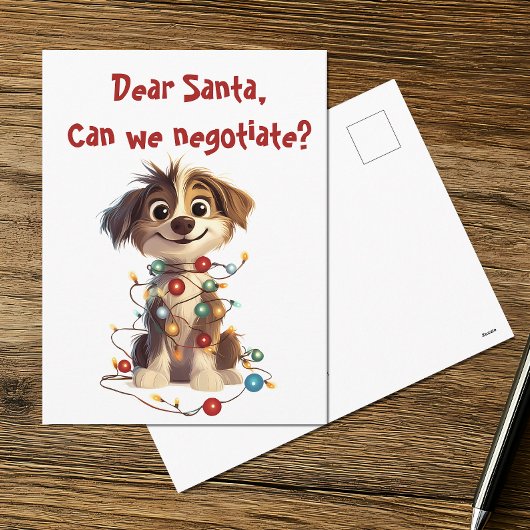 サンタさんへの手紙を書く子犬のクリスマス ポストカード