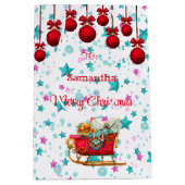 サンタそりピンクブルークリスマススターズがパーソナライズ ミディアムペーパーバッグ (正面)