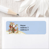 サンタと子ども歩くINスノーライトブルー ラベル (インサイチュ)