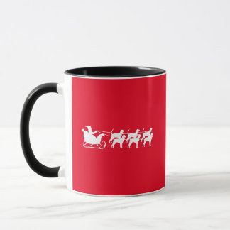 サンタと彼のクーンハウンドのそり マグカップ