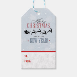 サンタと彼のトナカイ飛んでいるシルエットクリスマス ギフトタグ