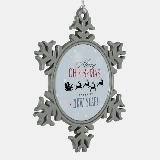 サンタと彼のトナカイ飛んでいるシルエットクリスマス スノーフレークピューターオーナメント (左)