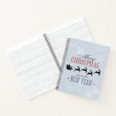 サンタと彼のトナカイ飛んでいるシルエットクリスマス ノートブック (内部)