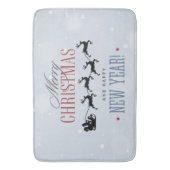 サンタと彼のトナカイ飛んでいるシルエットクリスマス バスマット (正面縦)