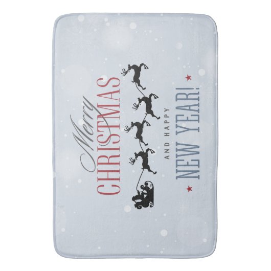 サンタと彼のトナカイ飛んでいるシルエットクリスマス バスマット (正面縦)