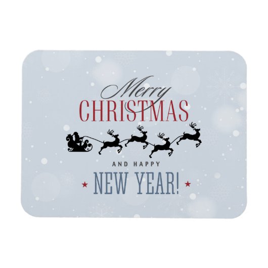 サンタと彼のトナカイ飛んでいるシルエットクリスマス マグネット (横)