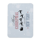 サンタと彼のトナカイ飛んでいるシルエットクリスマス マグネット (縦)