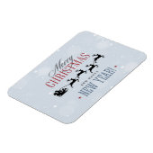 サンタと彼のトナカイ飛んでいるシルエットクリスマス マグネット (左側)