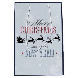 サンタと彼のトナカイ飛んでいるシルエットクリスマス ミディアムペーパーバッグ