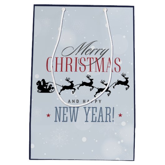 サンタと彼のトナカイ飛んでいるシルエットクリスマス ミディアムペーパーバッグ (裏面)