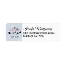 サンタと彼のトナカイ飛んでいるシルエットクリスマス ラベル