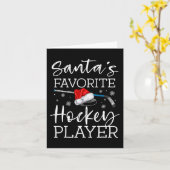 サンタのお気に入りのホッケー選手の楽しいパジャマクリスマス カード (黄色い花)