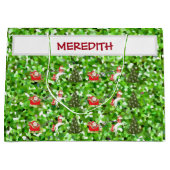 サンタのそりを引くユニコーンによるクリスマスプレゼント ラージペーパーバッグ (正面)