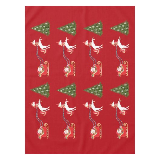 サンタのそりを引くユニコーンへのクリスマスプレゼント テーブルクロス (正面)