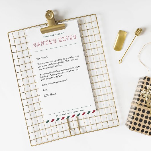 サンタのクリスマスレターのデスクから小人