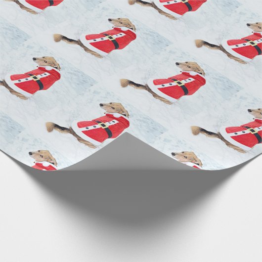 サンタのスーツのクリスマスを身に着けている雪のかわいい犬 ラッピングペーパー (角)