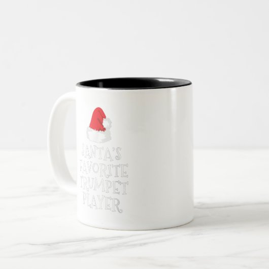 サンタのトお気に入りのランペット選手，クリスマスギフトおもしろい ツートーンマグカップ (正面左)