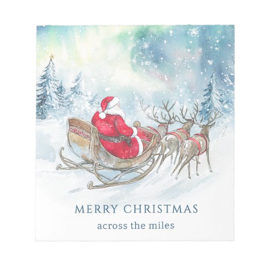 サンタのトナカイがそりを引いてミルズを越えて クリスマス ノートパッド (正面)