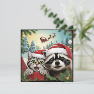 サンタのトナカイと一緒に撮った猫のセルフィー　おかしいアライグマのクリスマス シーズンカード
