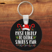 サンタのミルク・クリスマスを飲む可能性が最も高おもしろいい キーホルダー (正面)