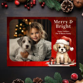 サンタの子犬メリーと明るい写真犬のクリスマス シーズンカード