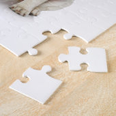 サンタの帽子およびトナカイの耳を搭載する子犬 ジグソーパズル (側面)