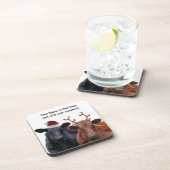 サンタの帽子および(雄ジカの)枝角のクリスマスの休日牛 コースター (右側)