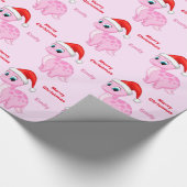 サンタの帽子とのかわいいピンクのDinosour ラッピングペーパー (角)