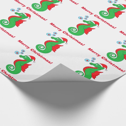 サンタの帽子とのタツノオトシゴのメリークリスマス ラッピングペーパー (角)