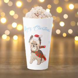サンタの帽子と雪の結晶に囲まれた愛らしいクリスマスのヨーキーのデザイン カフェラテマグ