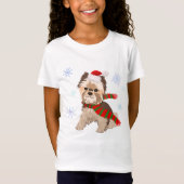 サンタの帽子と雪の結晶に囲まれた愛らしいクリスマスのヨーキーのデザイン Tシャツ (正面)