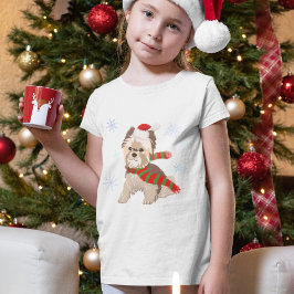 サンタの帽子と雪の結晶に囲まれた愛らしいクリスマスのヨーキーのデザイン Tシャツ