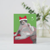 サンタの帽子のおもしろいなクリスマスの茶色のぶち猫 シーズンポストカード (スタンド正面)