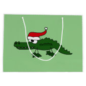 サンタの帽子のクリスマスのギフトバッグのおもしろいなわに ラージペーパーバッグ (裏面)