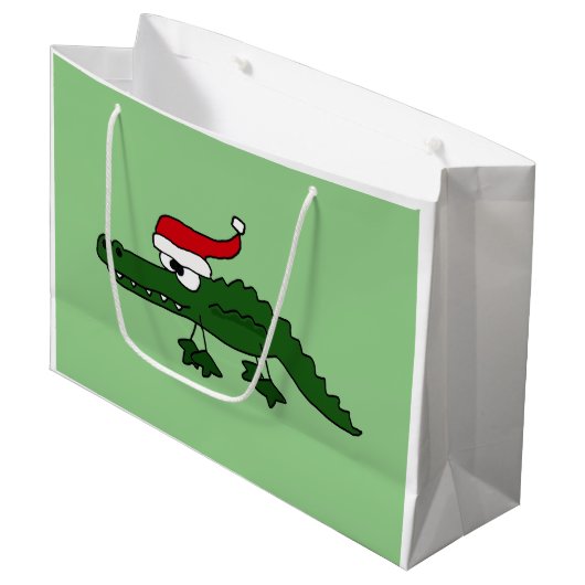 サンタの帽子のクリスマスのギフトバッグのおもしろいなわに ラージペーパーバッグ (正面アングル)