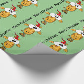 サンタの帽子のクリスマスの芸術のおもしろいなキリン ラッピングペーパー (角)