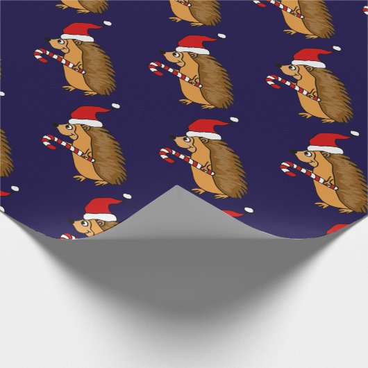 サンタの帽子のクリスマスの芸術のおもしろいなハリネズミ ラッピングペーパー (角)