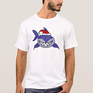 サンタの帽子のクリスマスの芸術を身に着けている微笑の鮫 Tシャツ