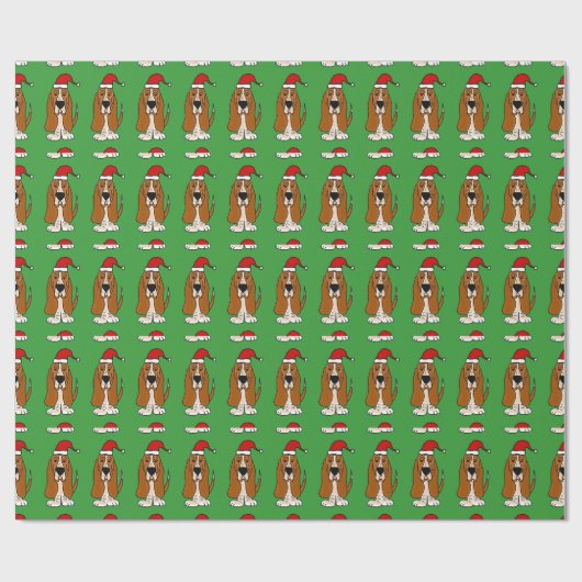 サンタの帽子のクリスマスの覆いを身に着けているバセットハウンド ラッピングペーパー (フラット)