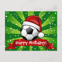 サンタの帽子のクリスマスを身に着けているサッカーボール シーズンポストカード