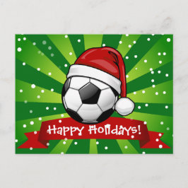 サンタの帽子のクリスマスを身に着けているサッカーボール シーズンポストカード