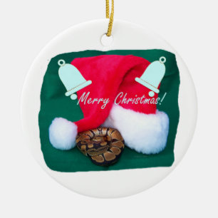 サンタの帽子のメリークリスマスおよび鐘によって蛇行させて下さい セラミックオーナメント