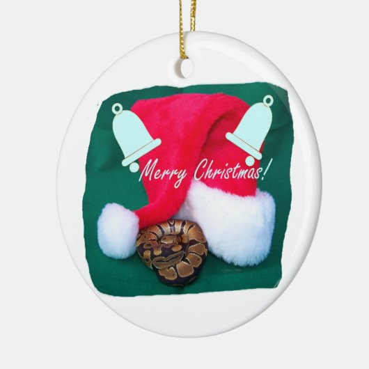 サンタの帽子のメリークリスマスおよび鐘によって蛇行させて下さい セラミックオーナメント (左)