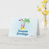 サンタの帽子の季節のごあいさつのピンクのフラミンゴ カード (黄色い花)